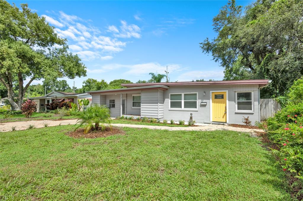 front view of a house with a yard