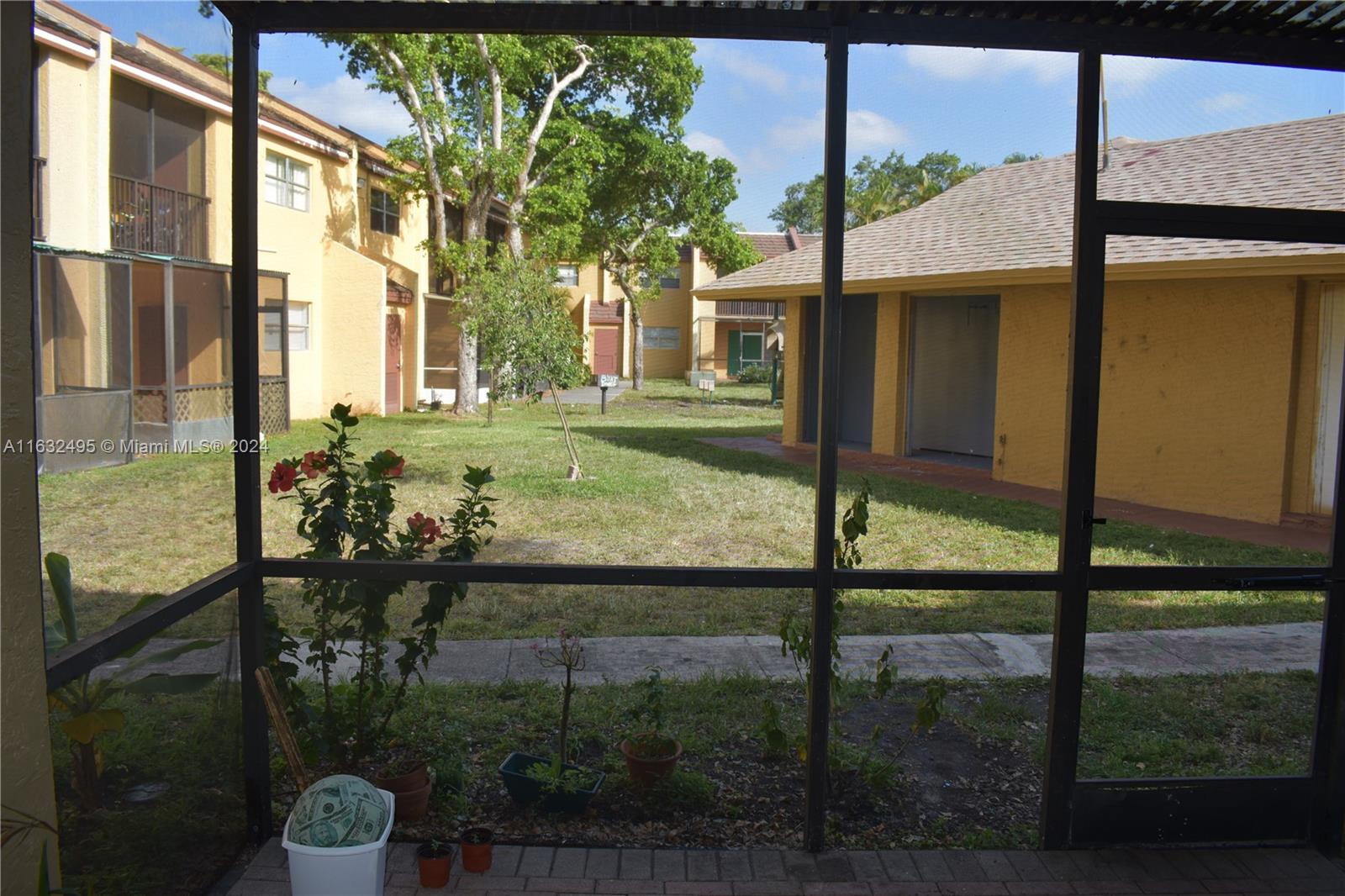 a view of a porch with a tree