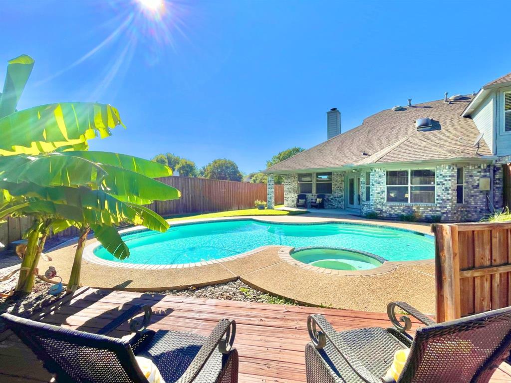 a view of a house with a swimming pool