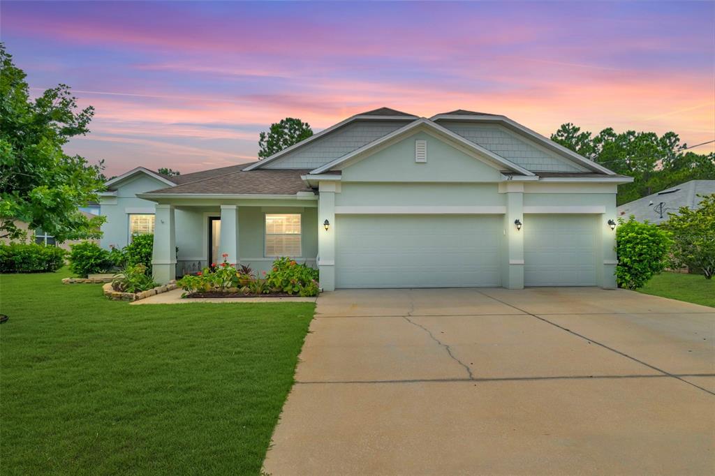 front view of house with a yard