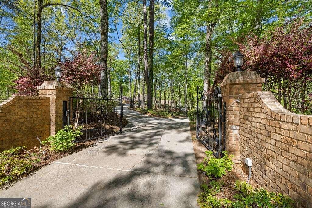 a view of backyard with patio