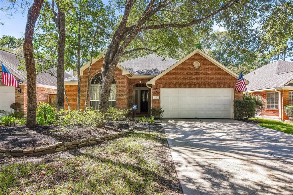 Photograph showing view of the front of the home.  Note the covered front entry.