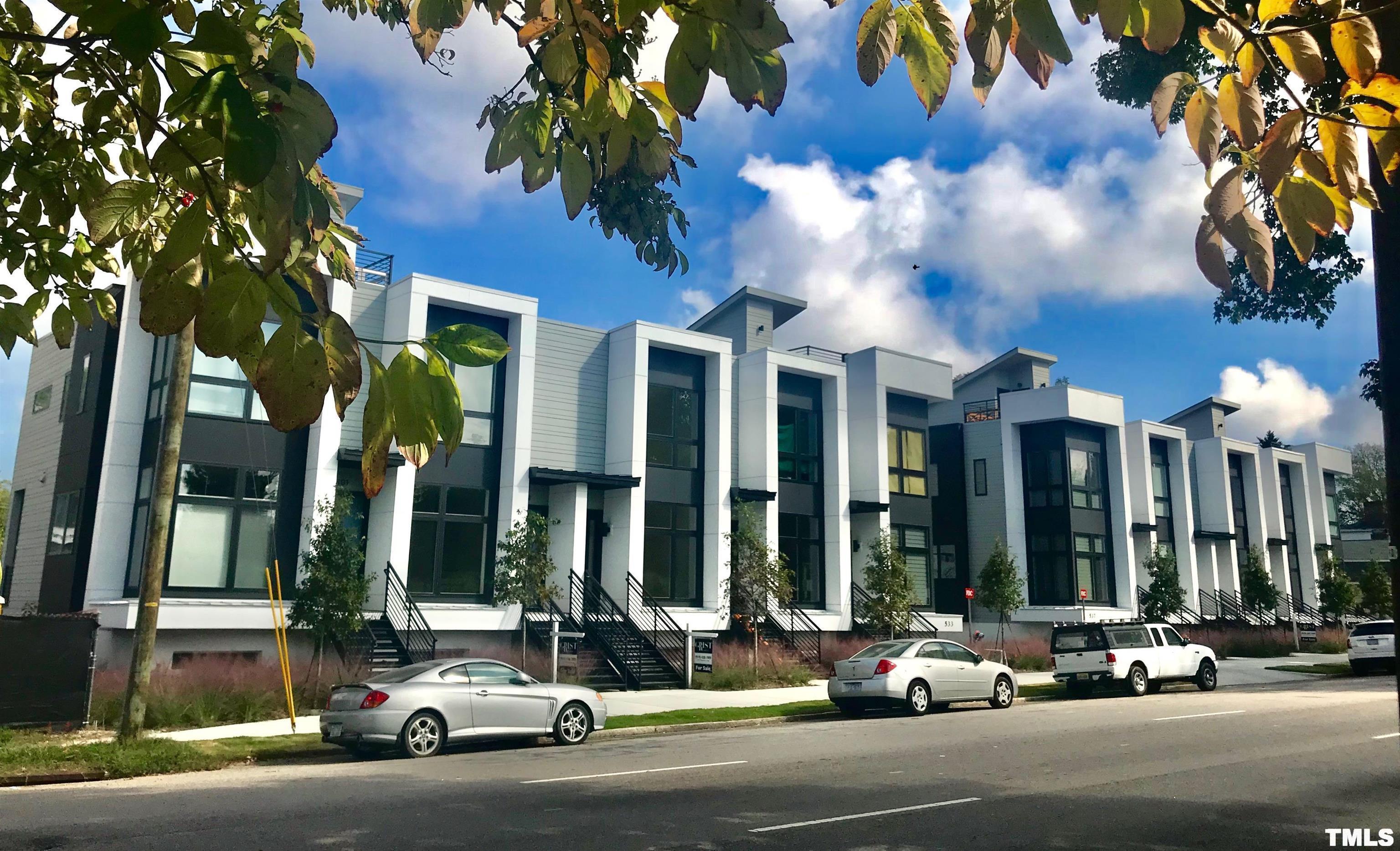 a cars parked in front of a building