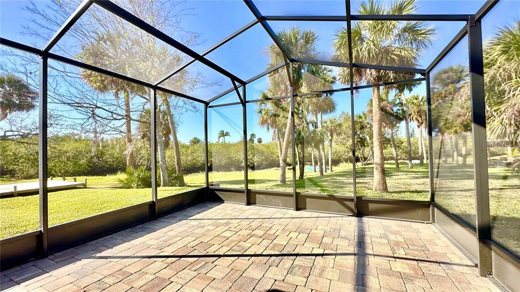 Screened Lanai overlooking backyard and Canal!