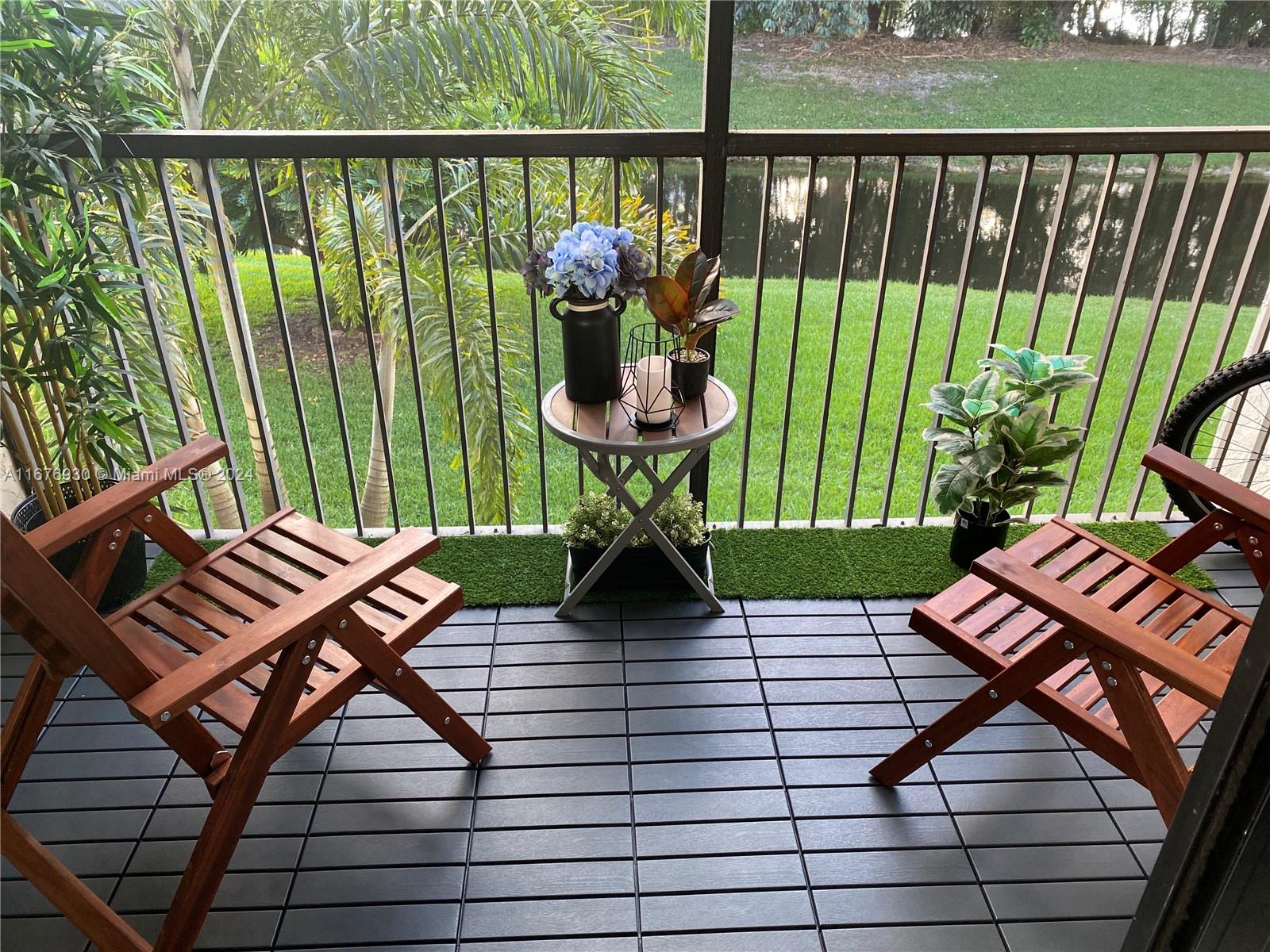 a view of a two chairs in the roof deck