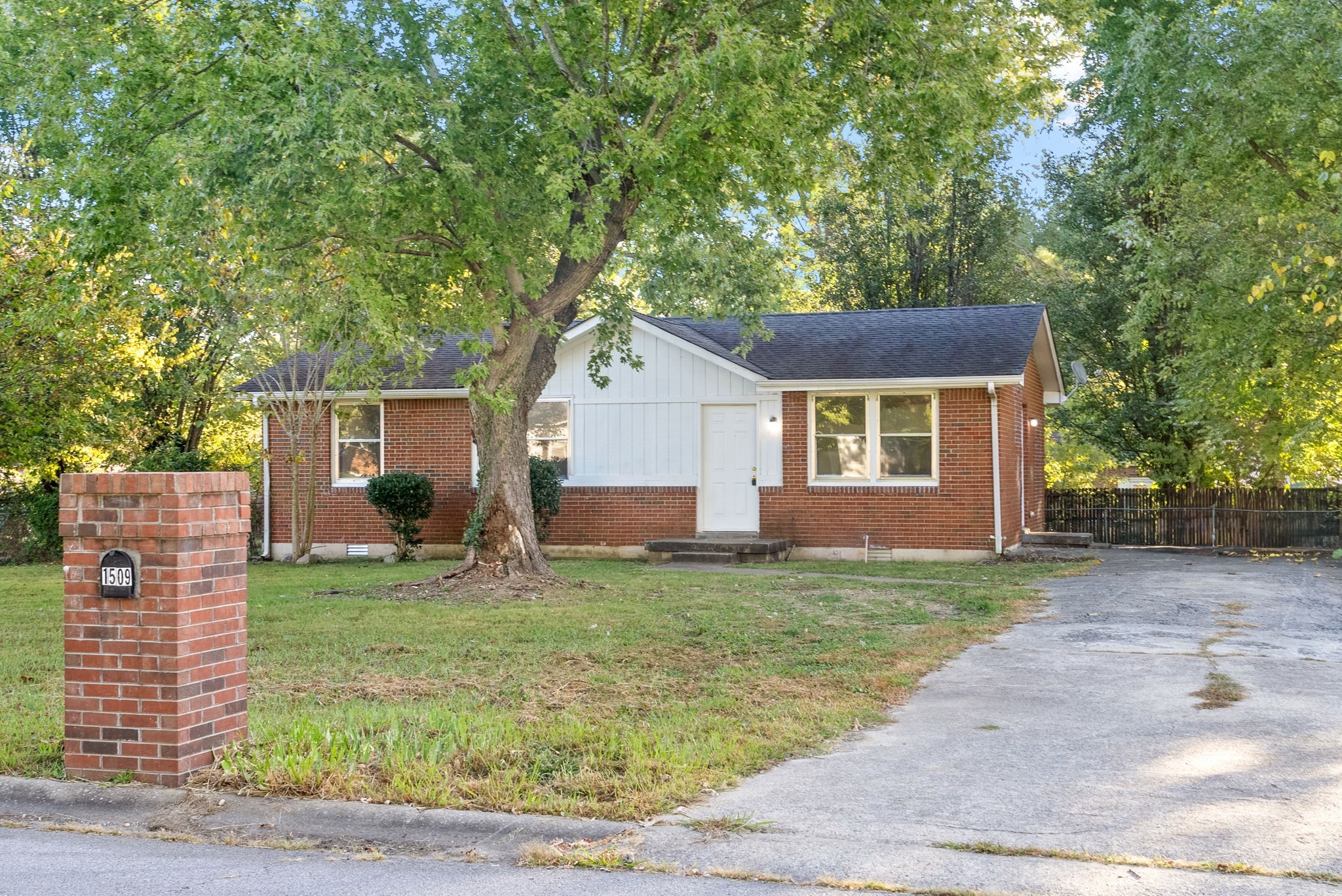 front view of a house with a yard