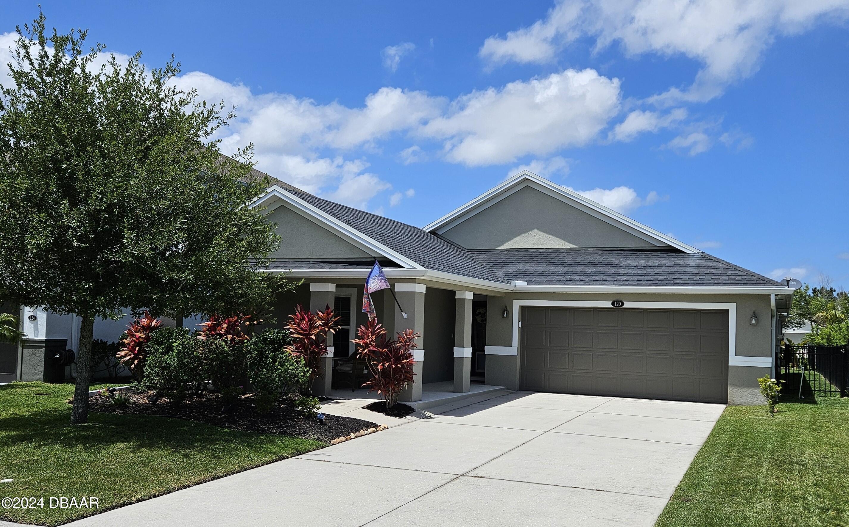 a front view of house with yard