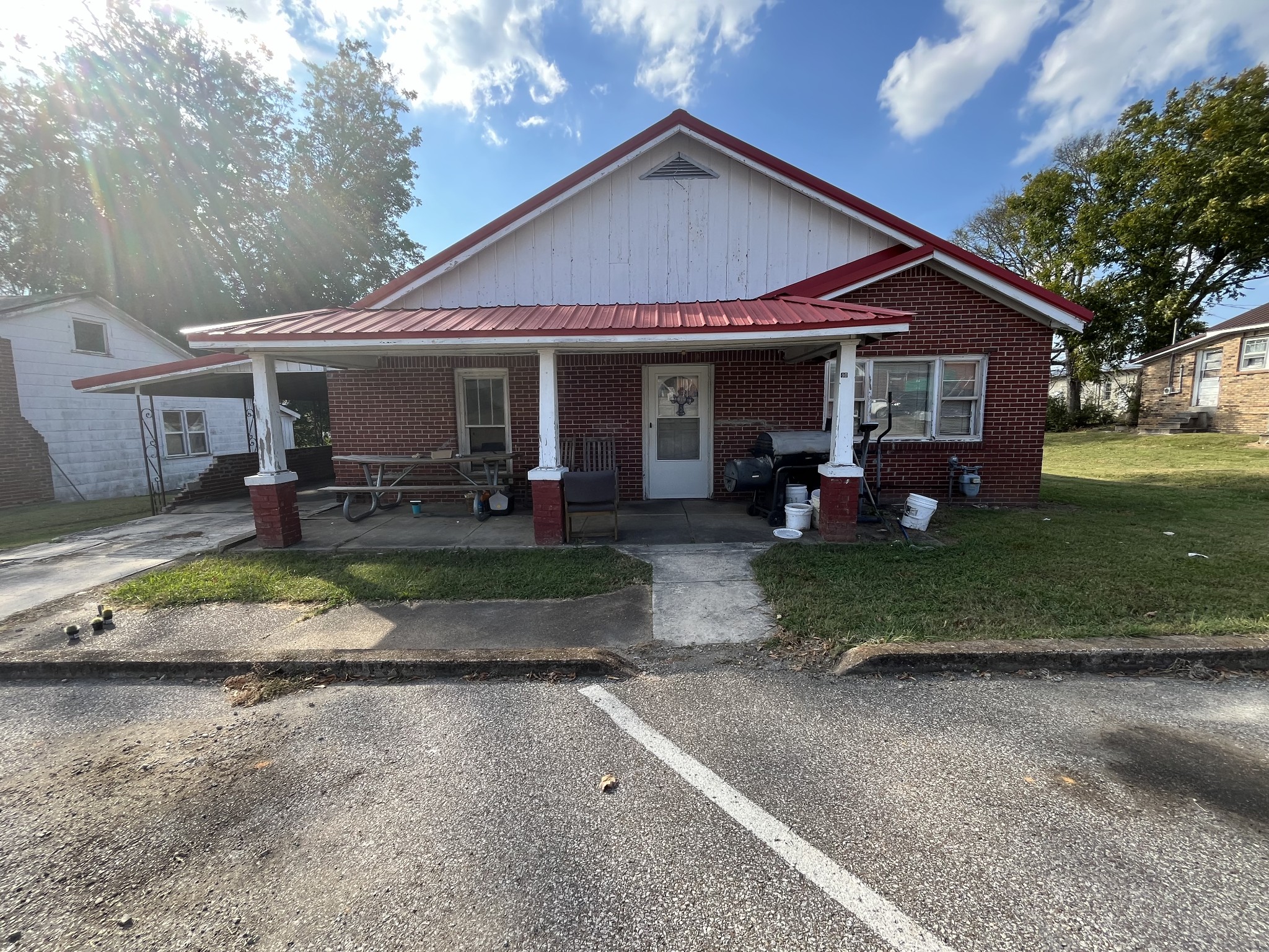 front view of a house with a yard