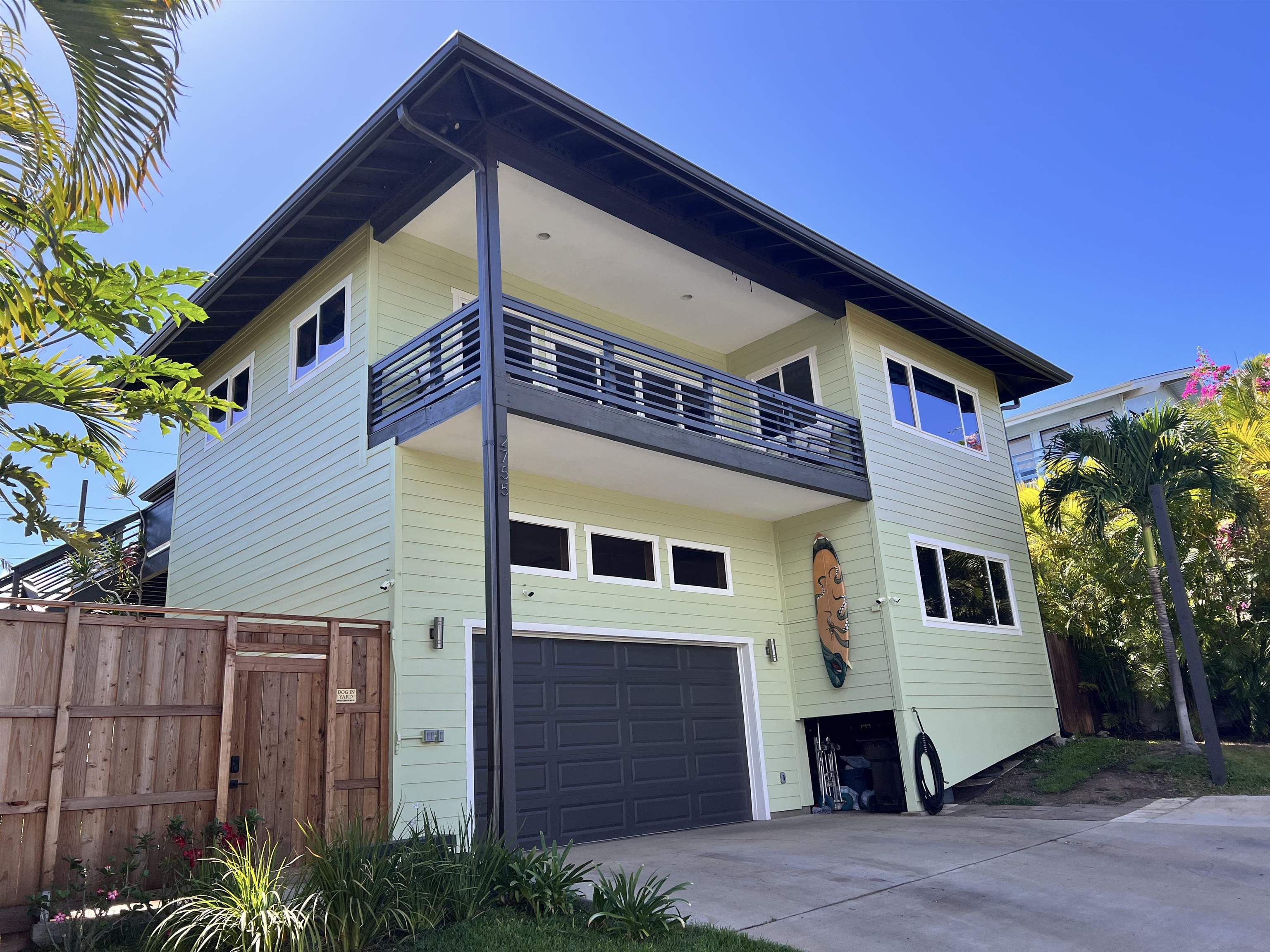 a front view of a house with a garage