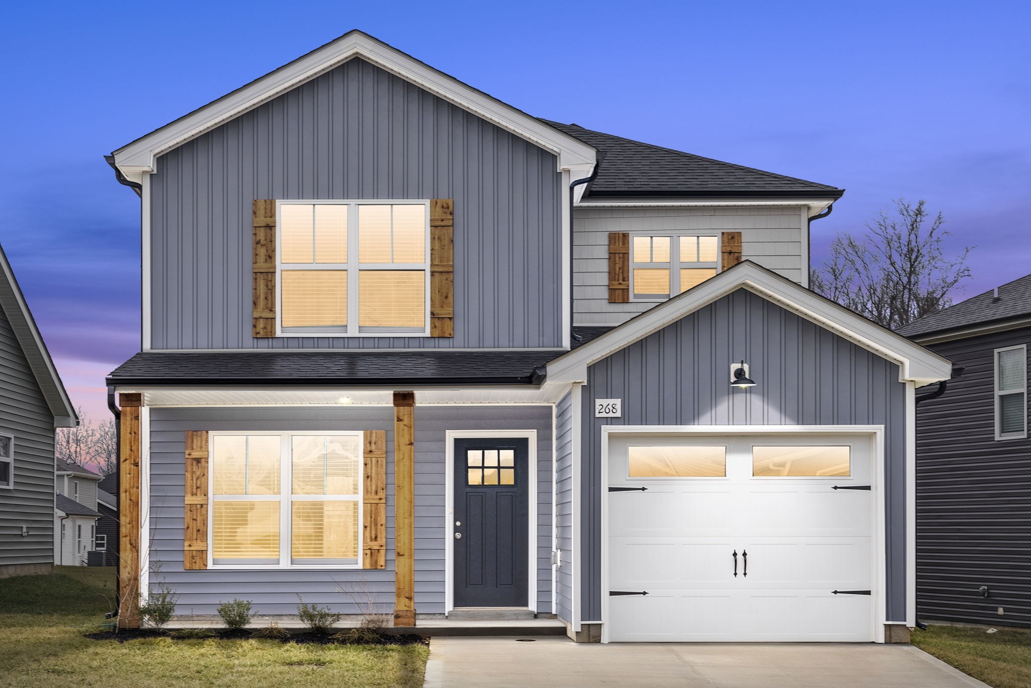 a front view of a house with a yard