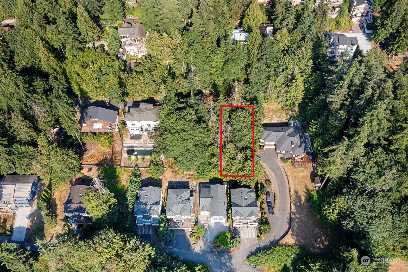 an aerial view of a house with outdoor space