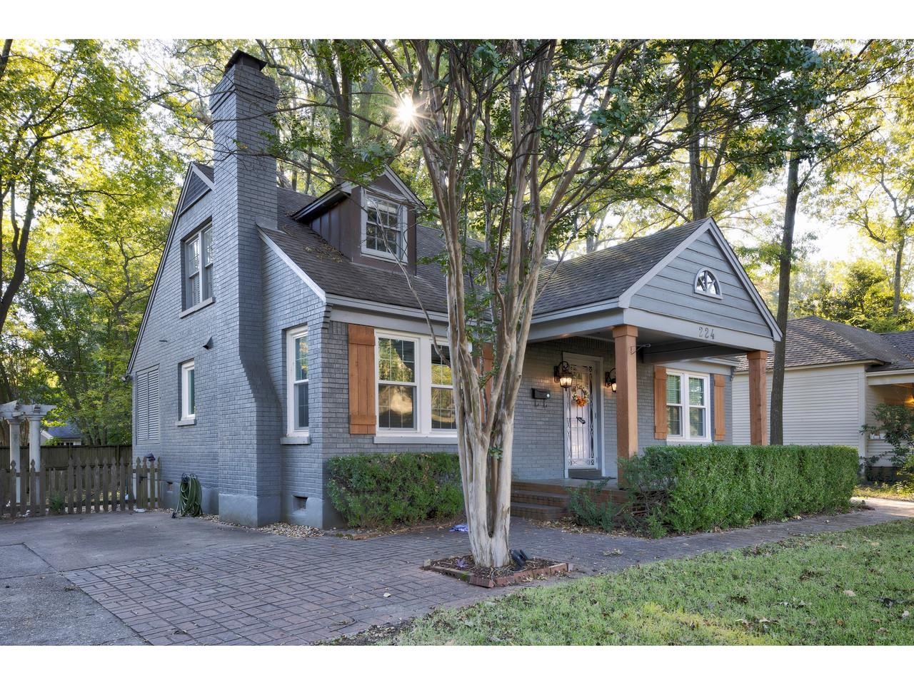 Cape cod-style house with covered porch