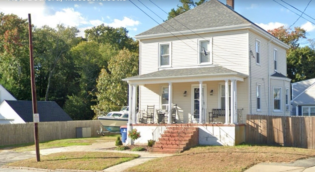 a view of a house with a patio