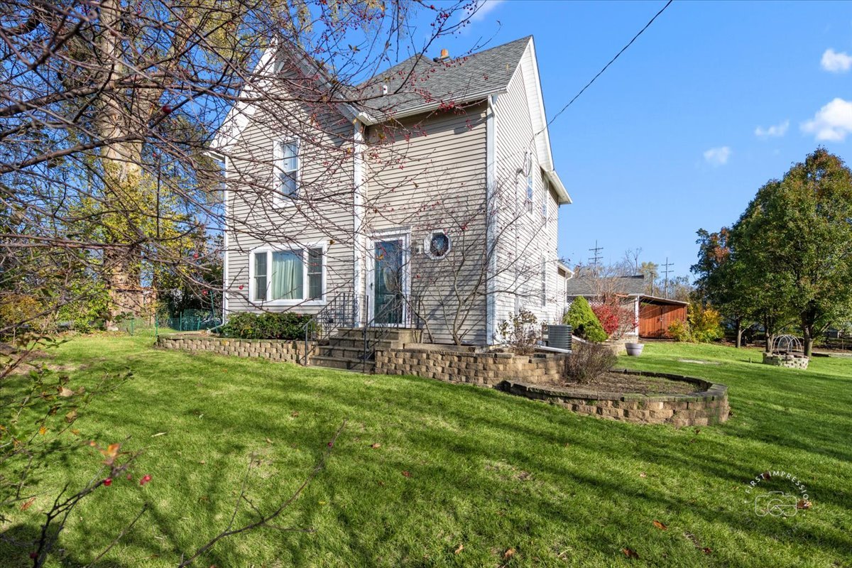 a front view of house with yard