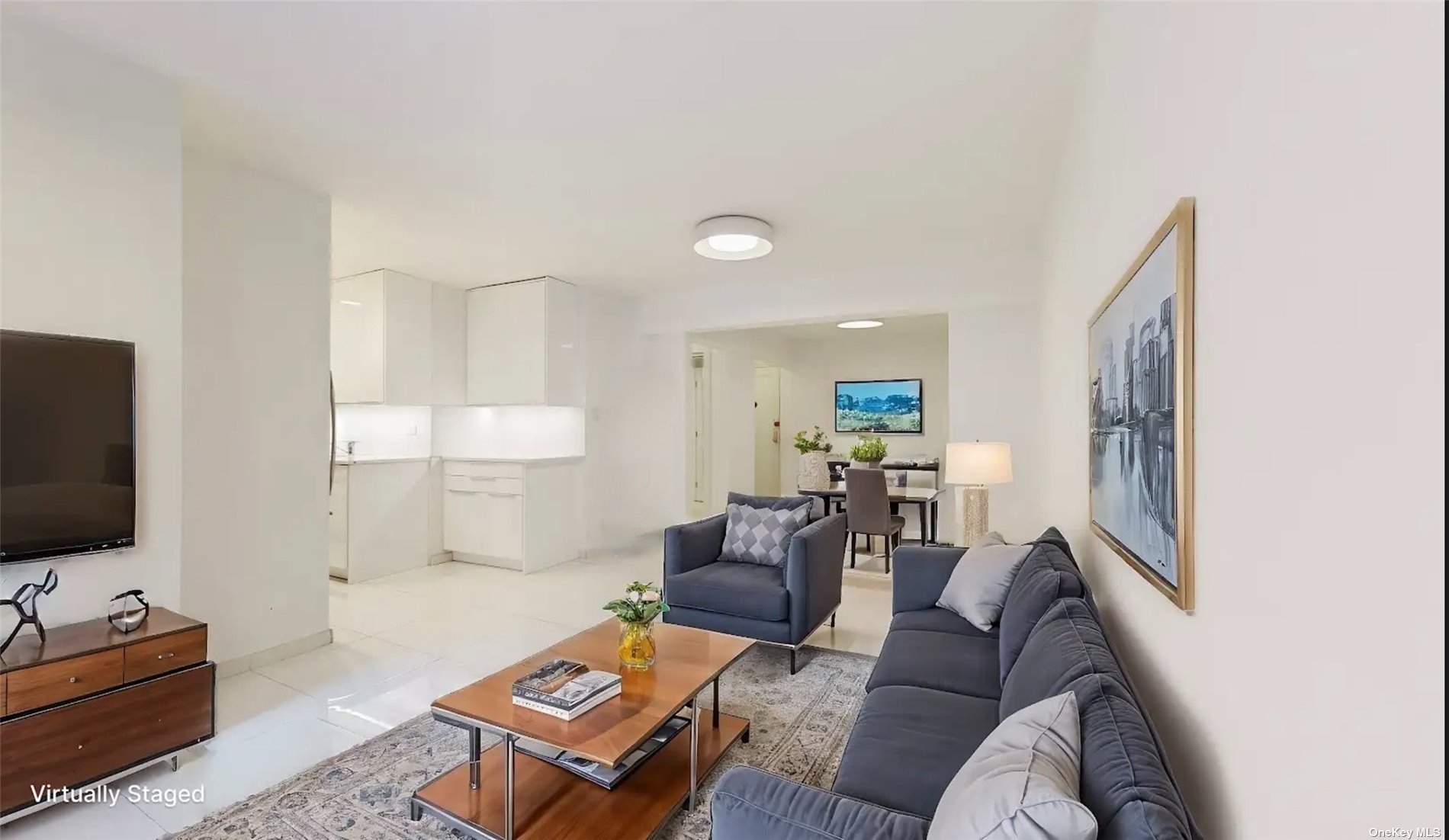 a living room with furniture and a flat screen tv