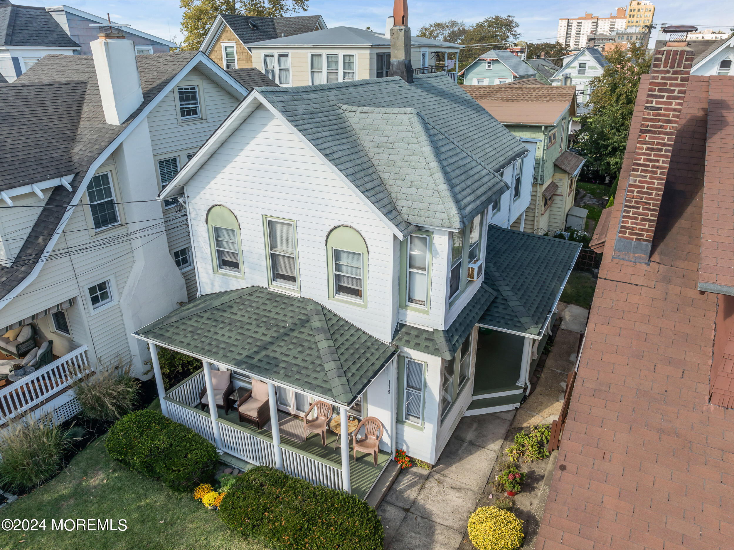 a aerial view of a house with a yard