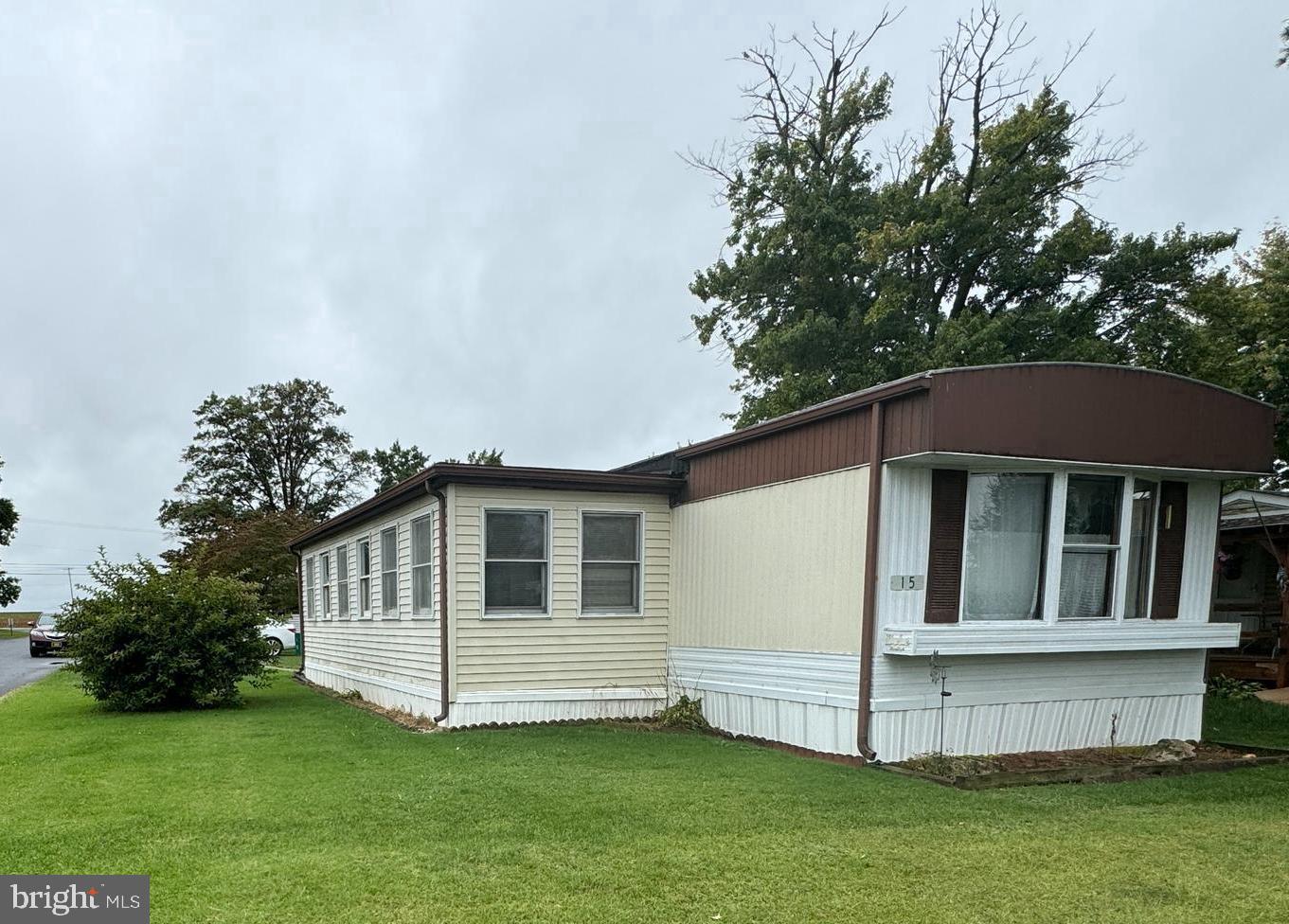 a house with trees in the background