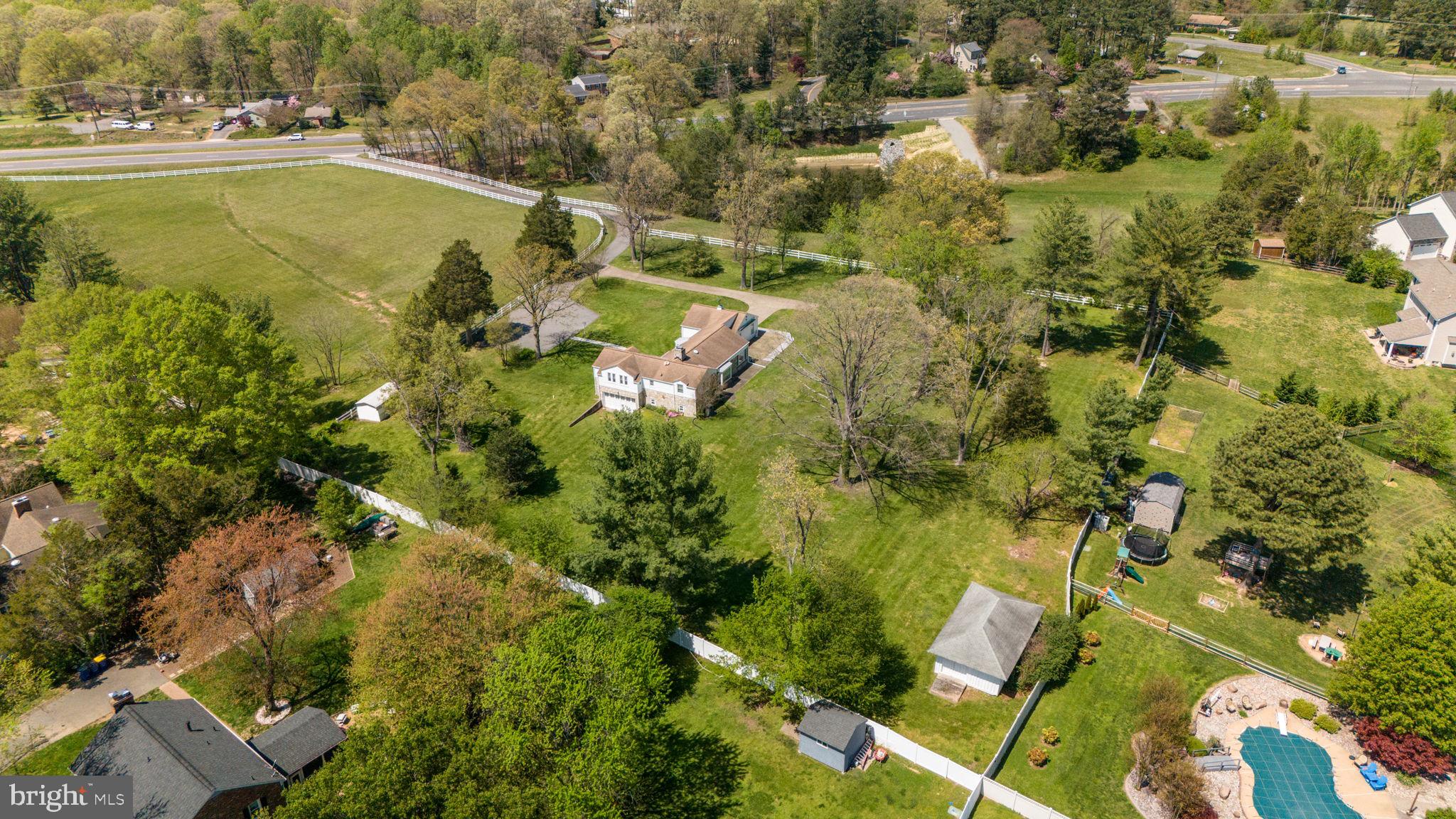 a view of a yard with an outdoor space