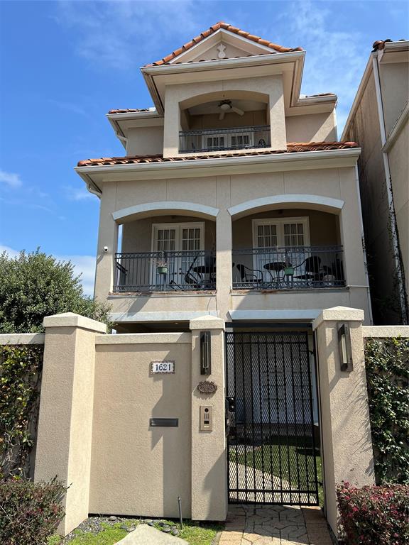 a front view of a house with a garage