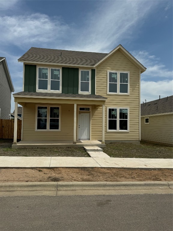 a front view of a house with a garage