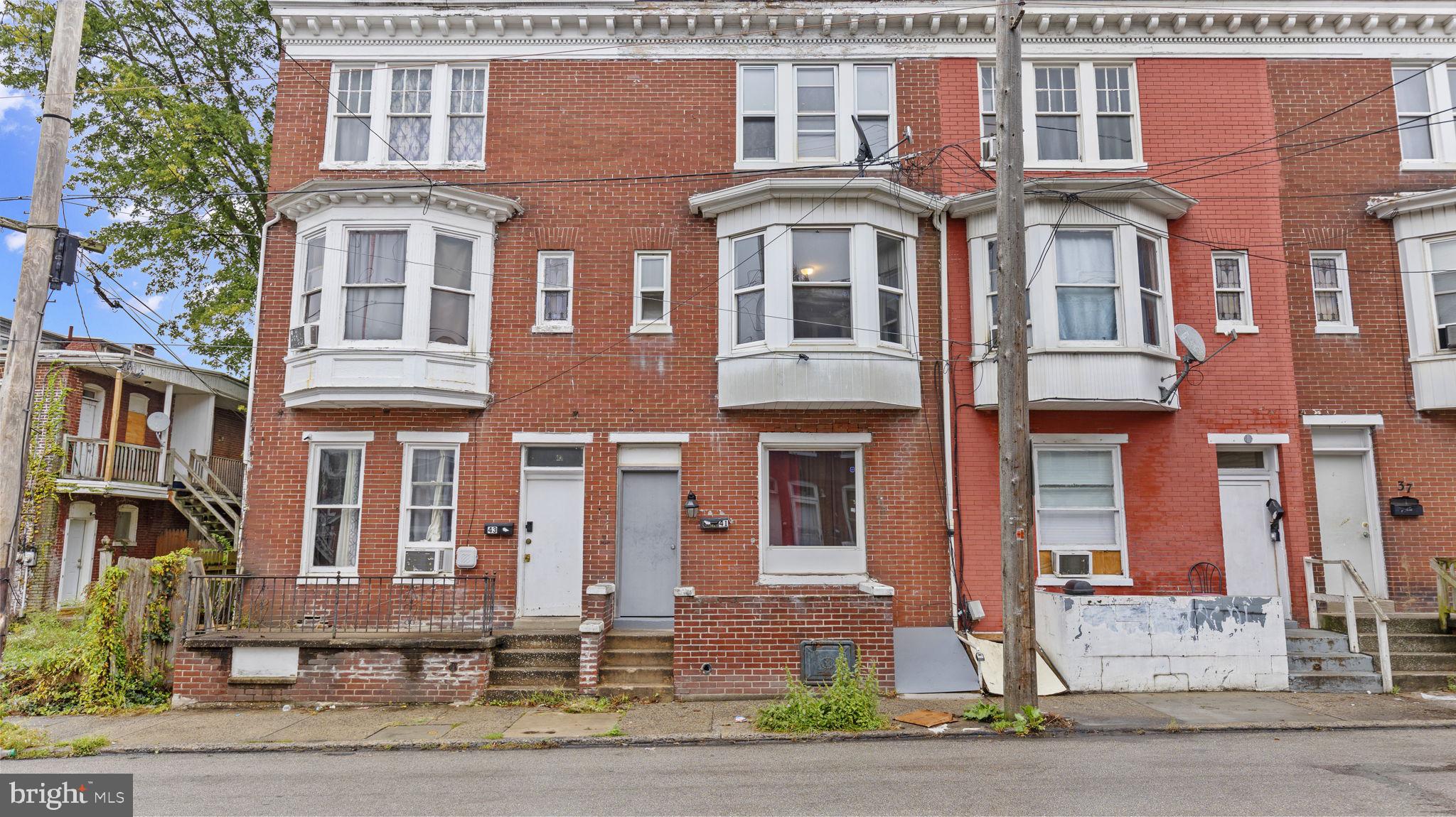 a front view of a multi story residential apartment building