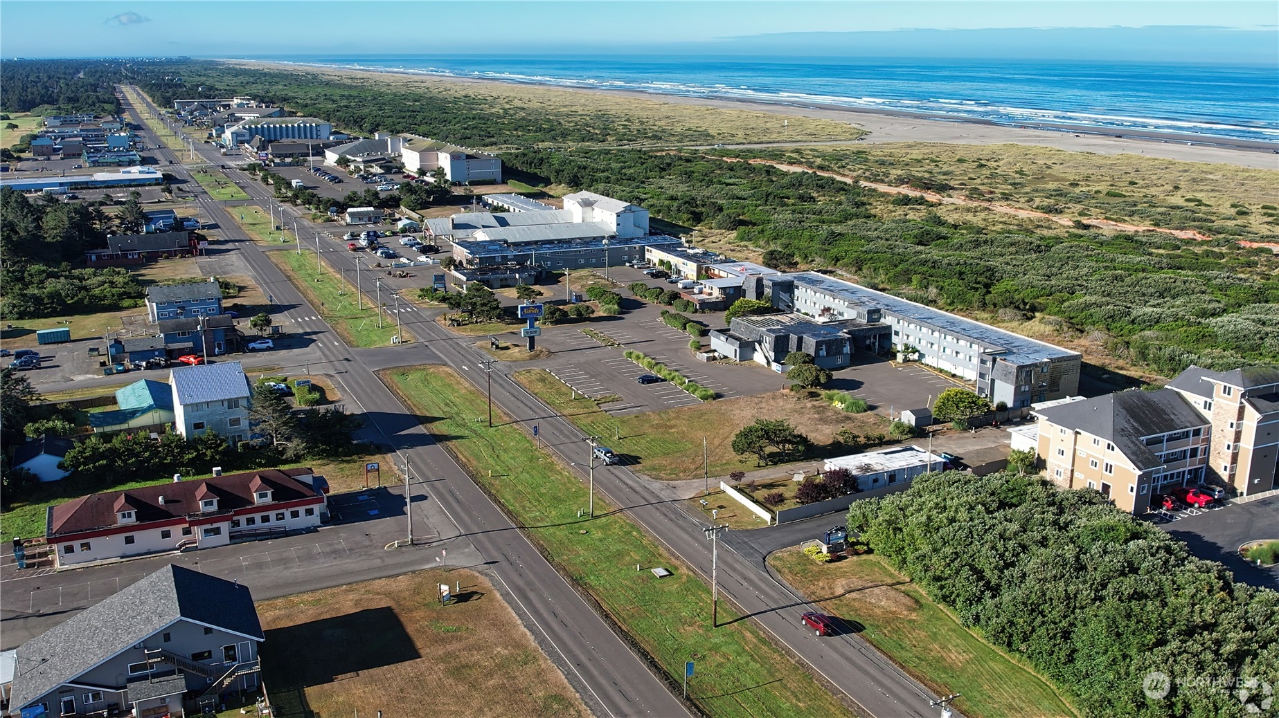 a view of a city with an ocean view