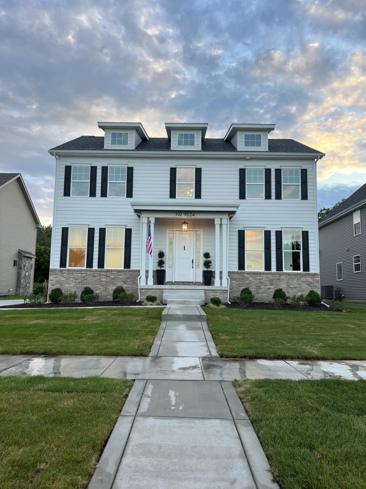 a front view of house with yard