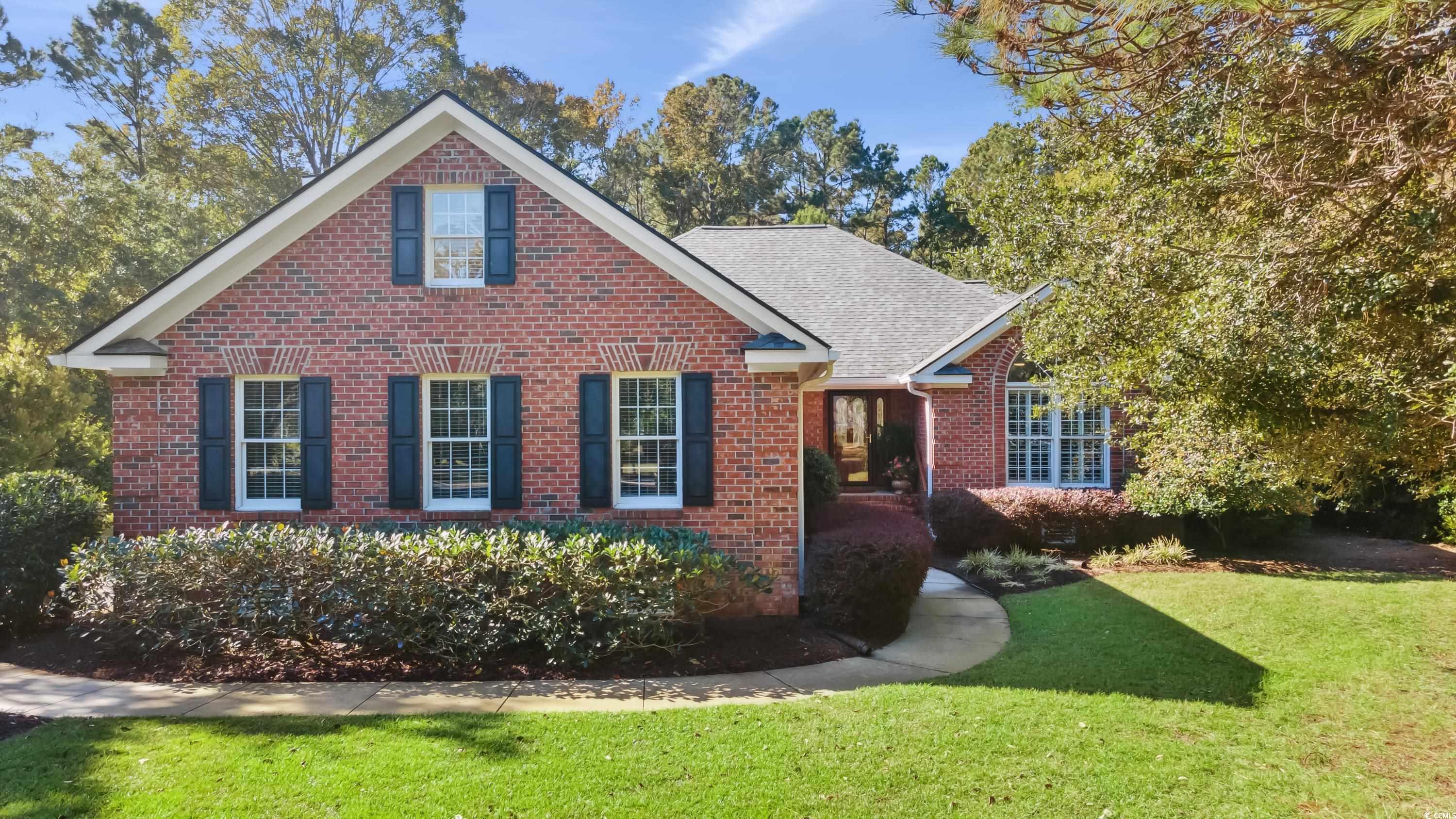 View of front of house with a front lawn