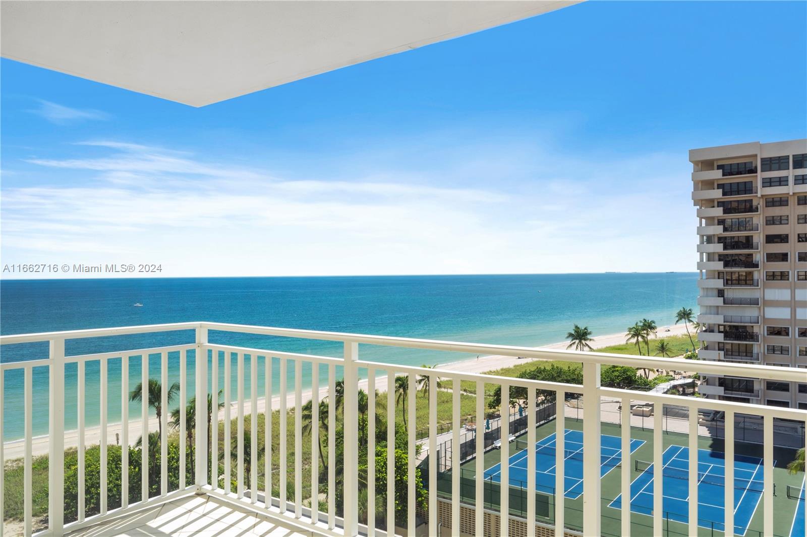 a balcony with an ocean view