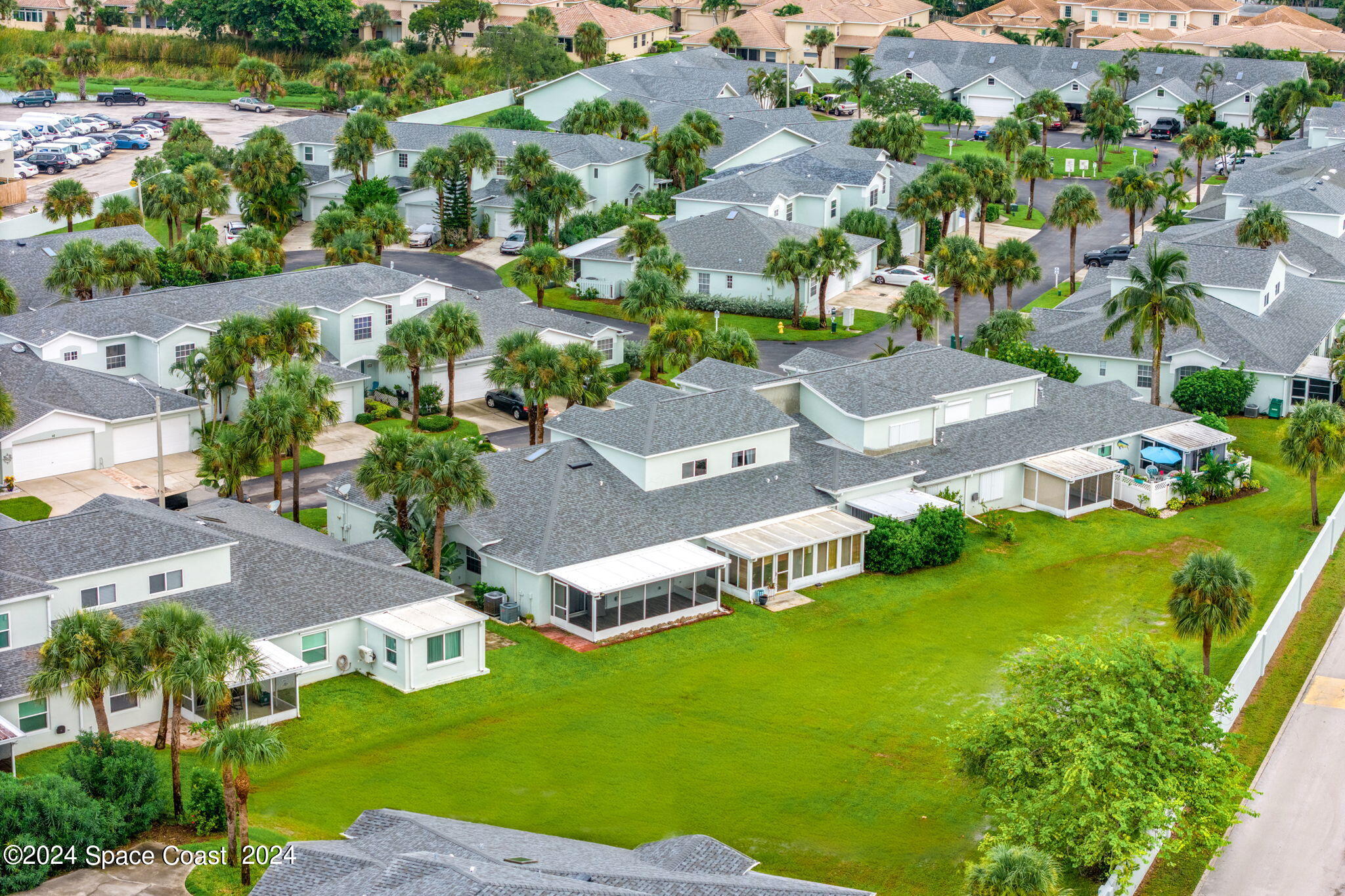 an aerial view of a house with a garden