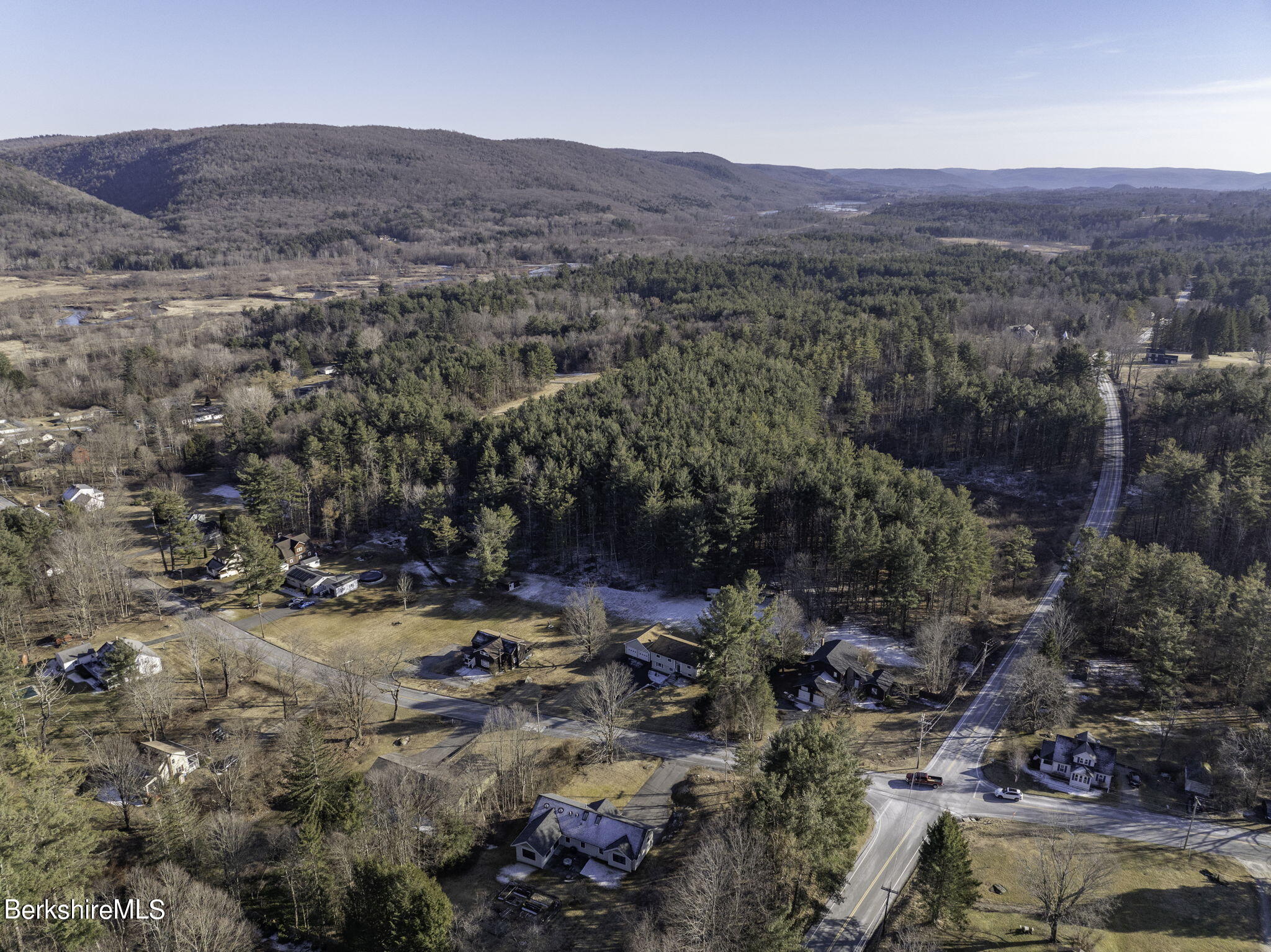 an aerial view of residential house and green space