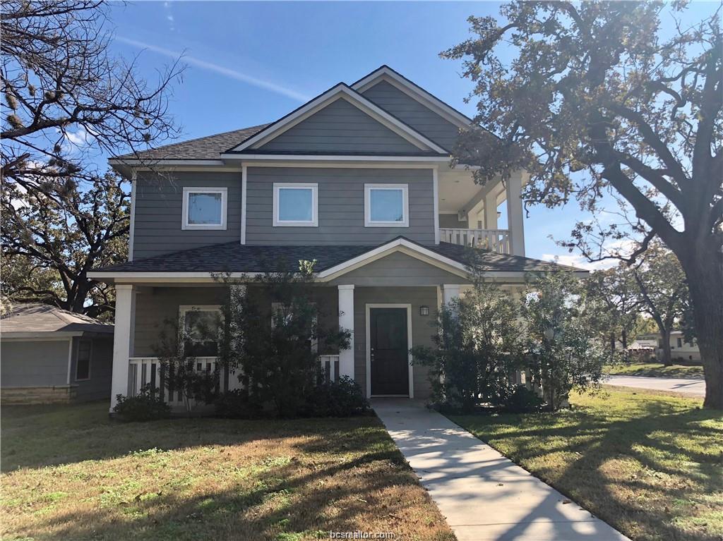 Craftsman-style house featuring covered porch and