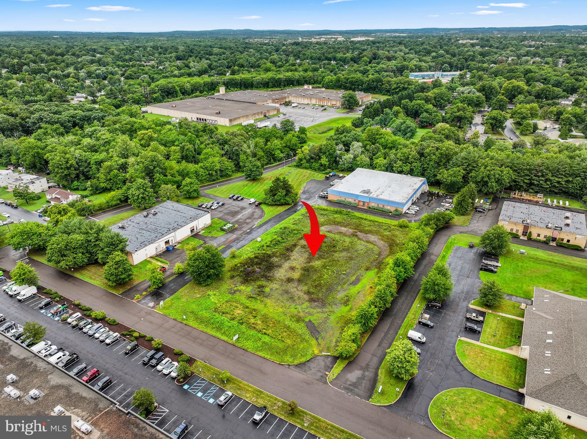 an aerial view of residential houses and outdoor space