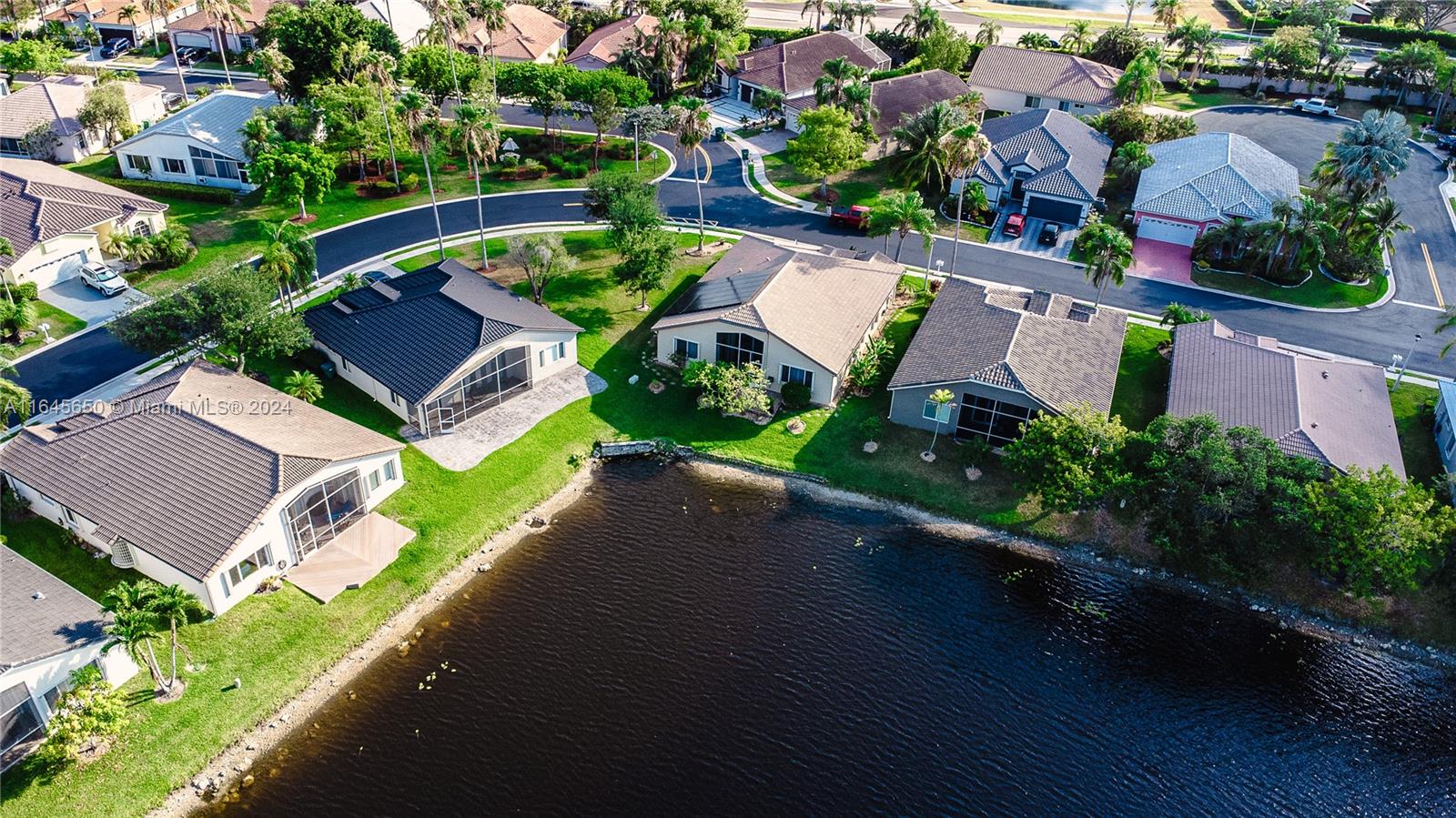 an aerial view of a house with a garden