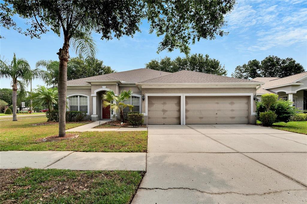 front view of a house with a yard