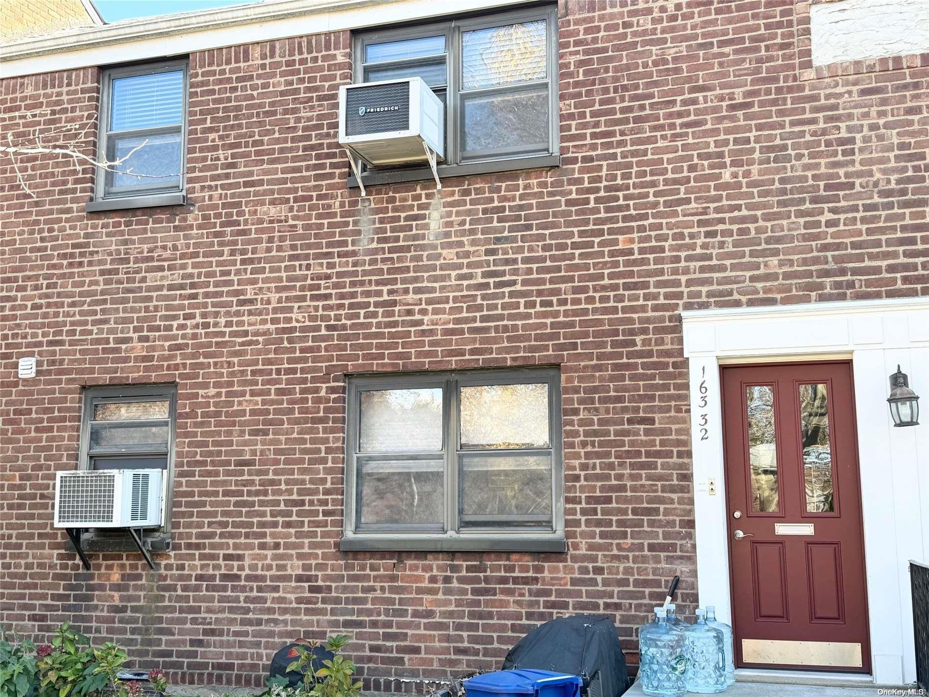 a brick building with a window