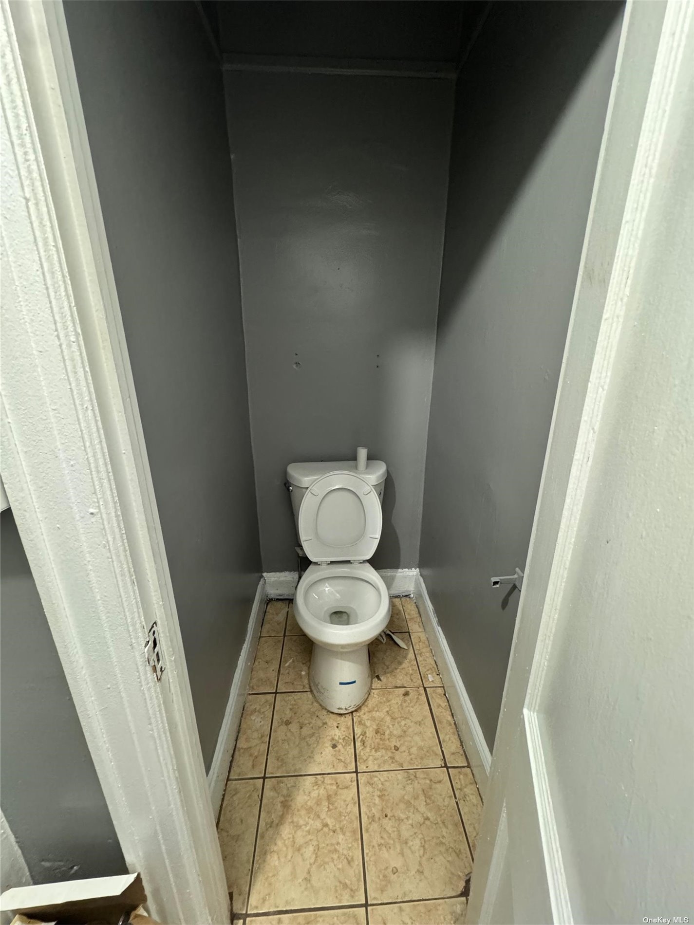 a bathroom with a toilet and a sink