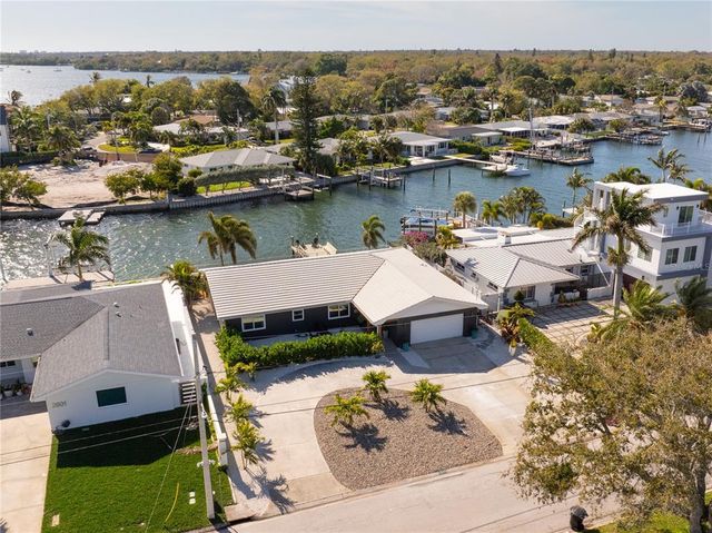 $1,589,999 | 2599 West Bay Isle Drive Southeast | Tropical Shores