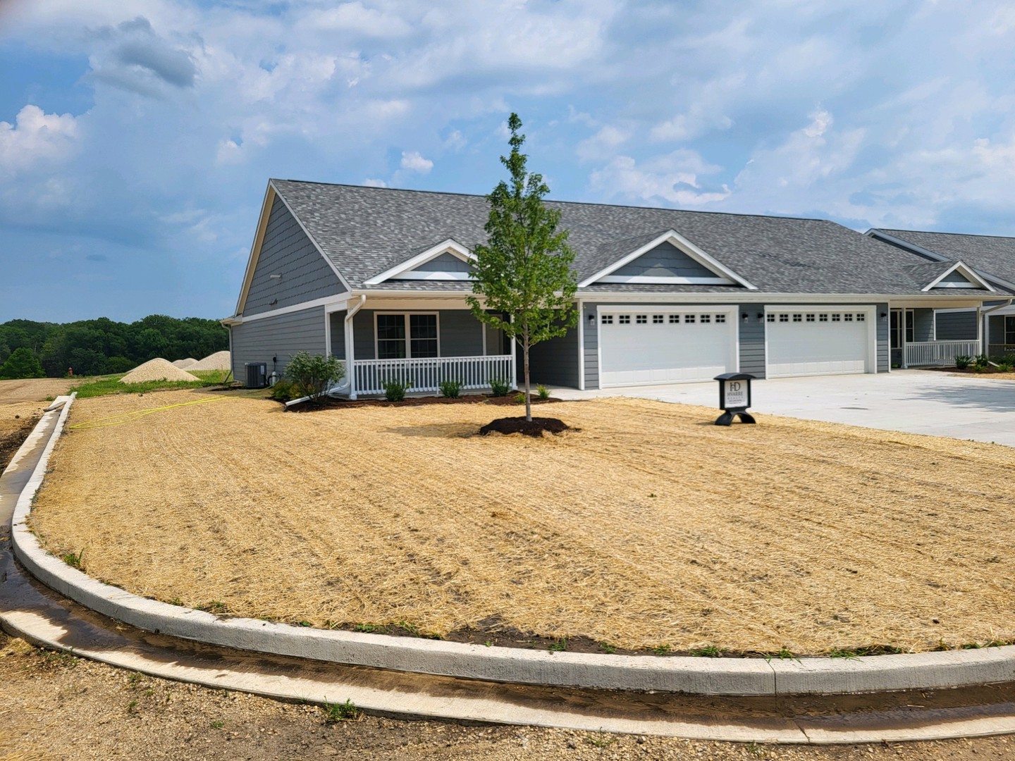 a house view with a garden space