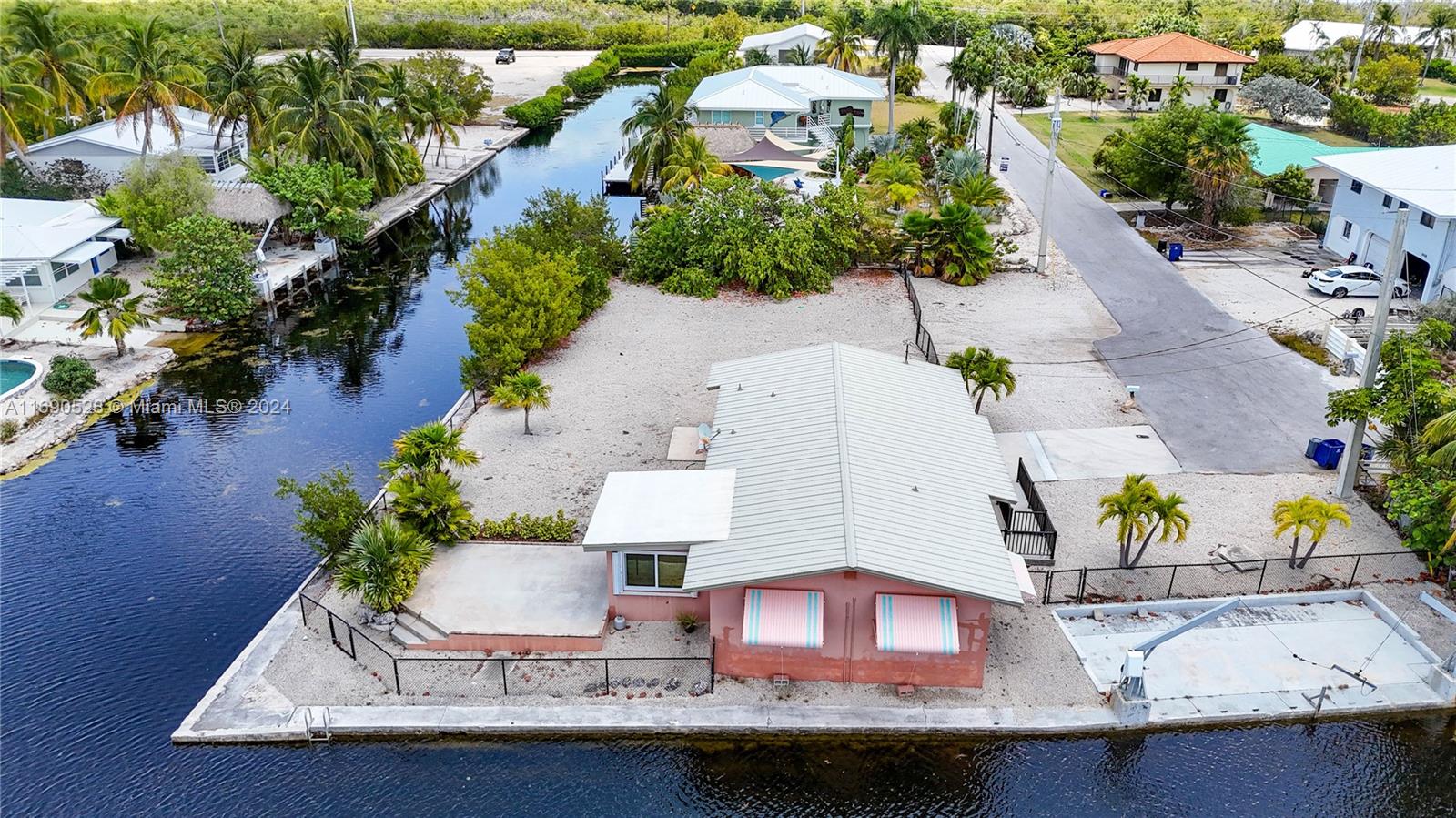 an aerial view of a house with outdoor space