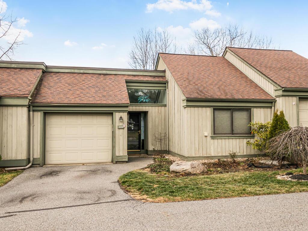 Single story home with a garage