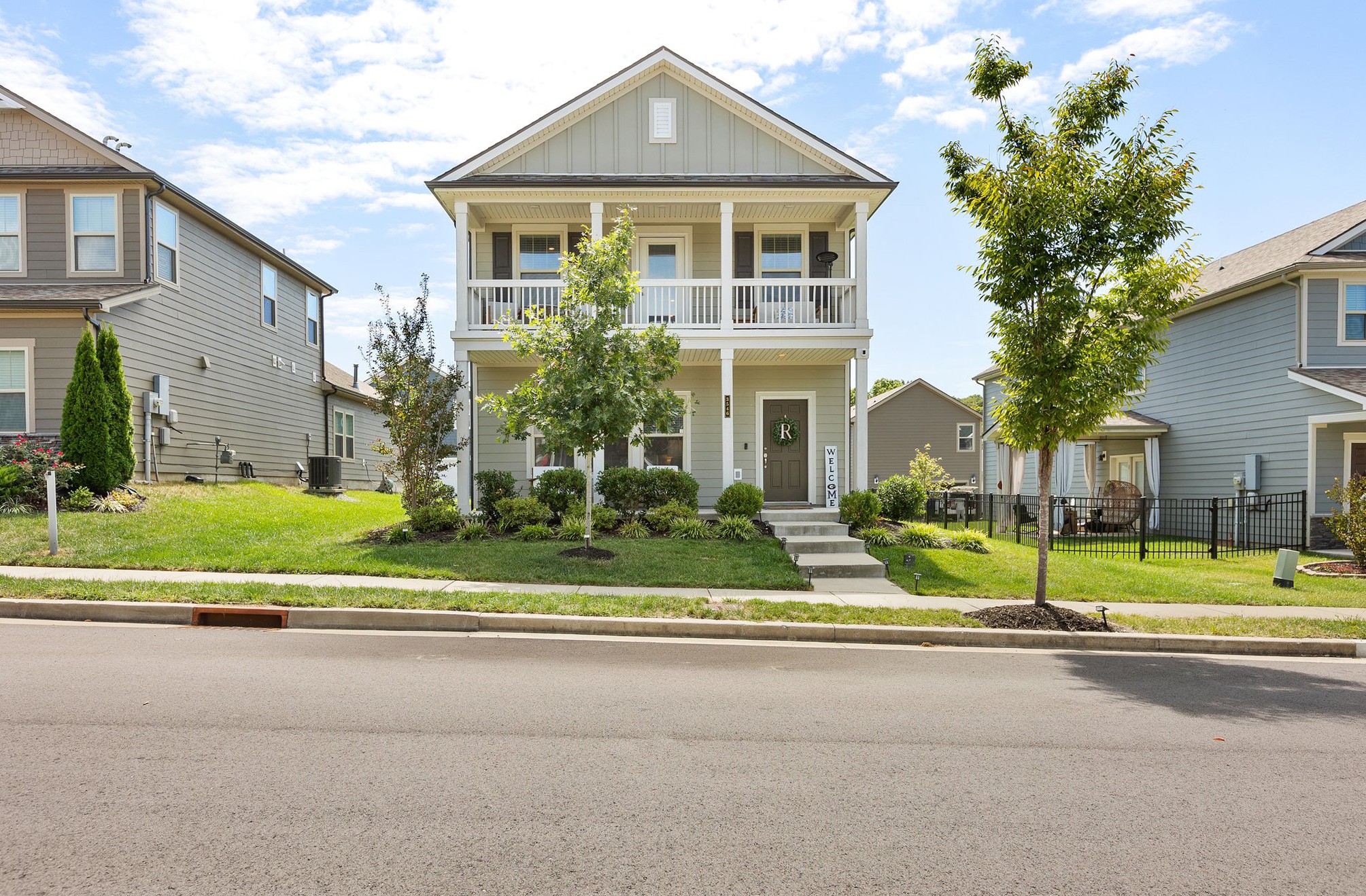 a front view of house with a yard