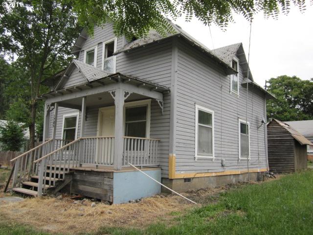 a front view of a house with garage