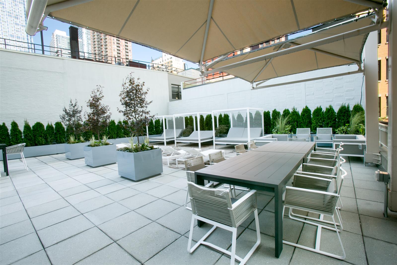 a outdoor space with lots of table and chairs