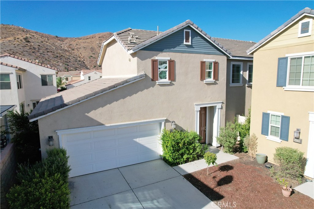 a house view with a outdoor space