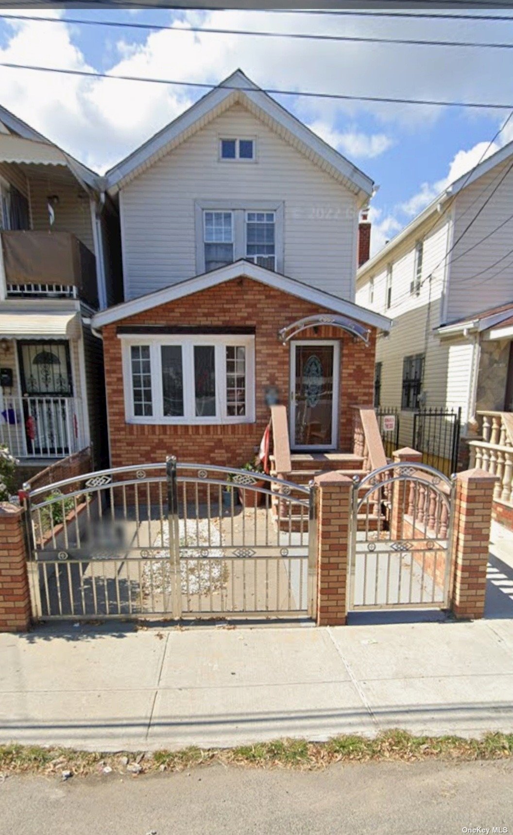 a front view of a house with a porch