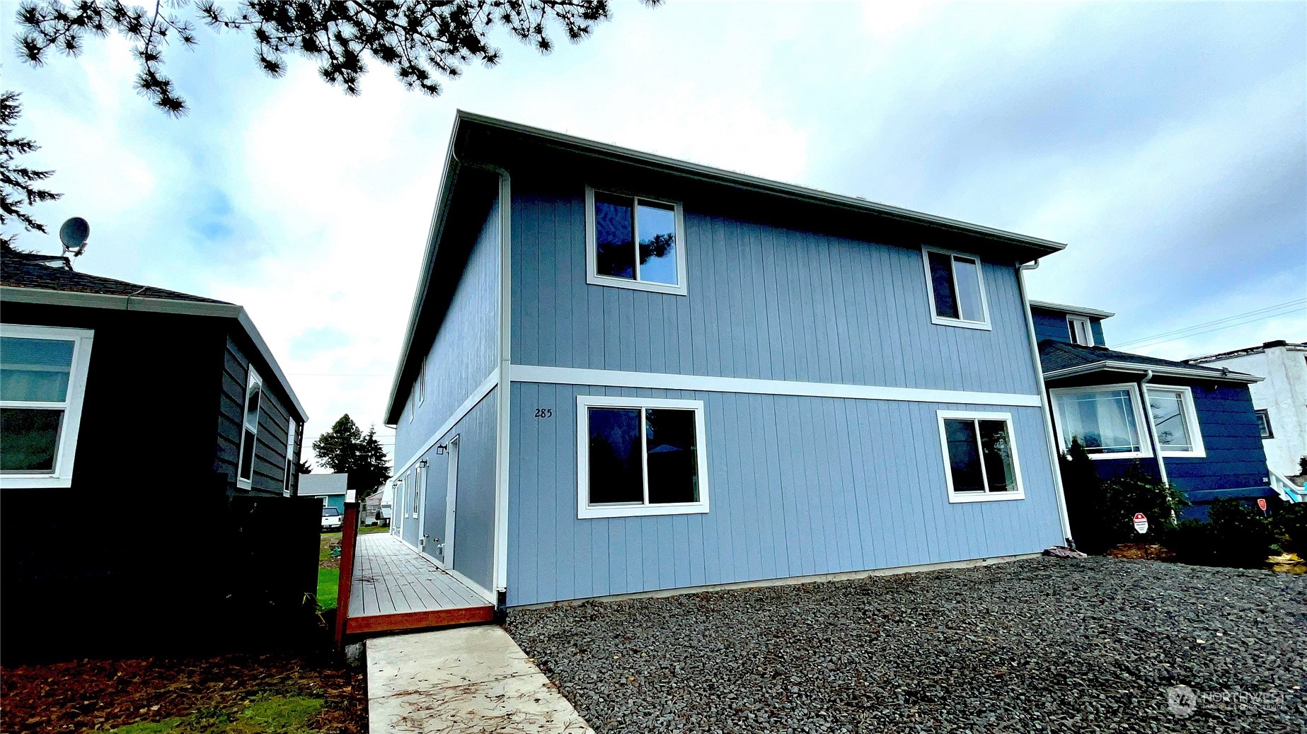 a front view of a house with windows