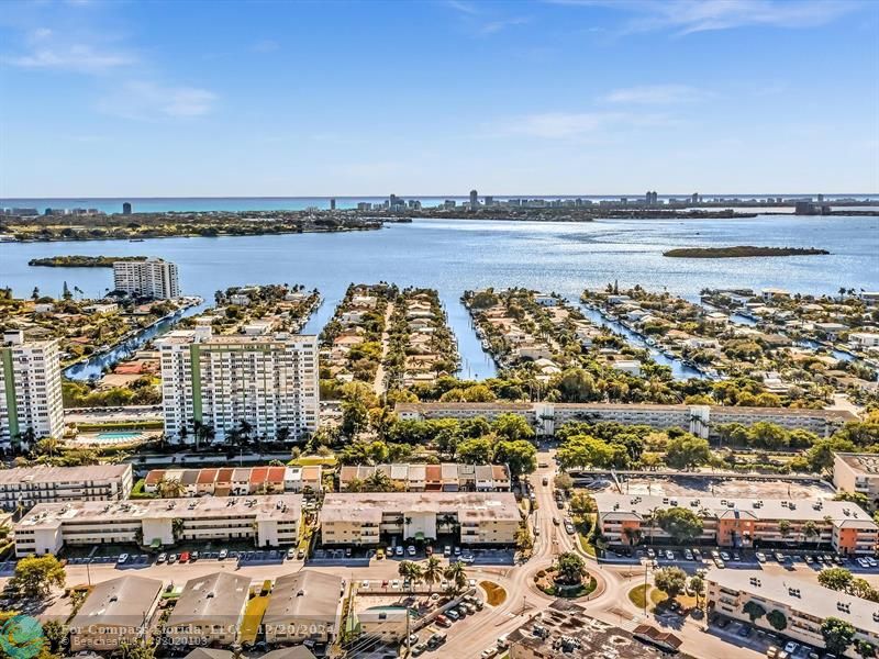 a view of a city and ocean