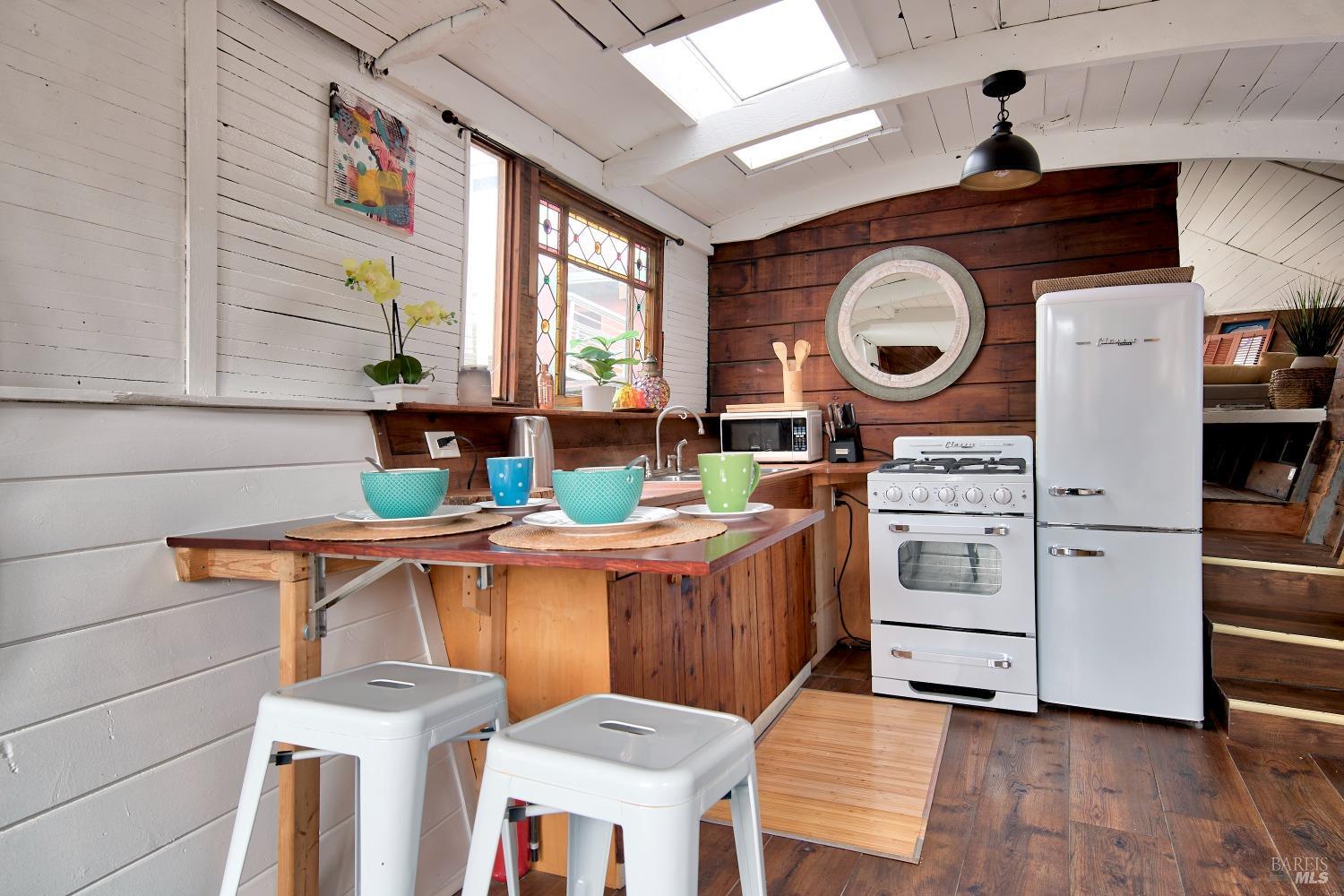The charming kitchen with breakfast nook.