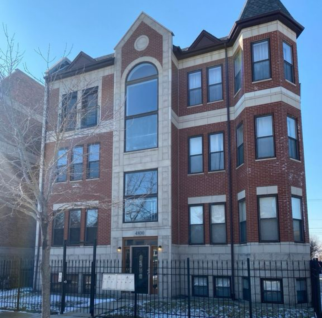 a front view of a multi story residential apartment building